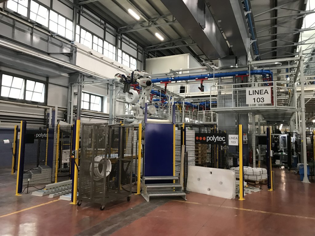Robotic coil unloading and palletizing cell